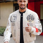 A guy is wearing AC Milan Off white Varsity Jacket while showing thumbs up sign