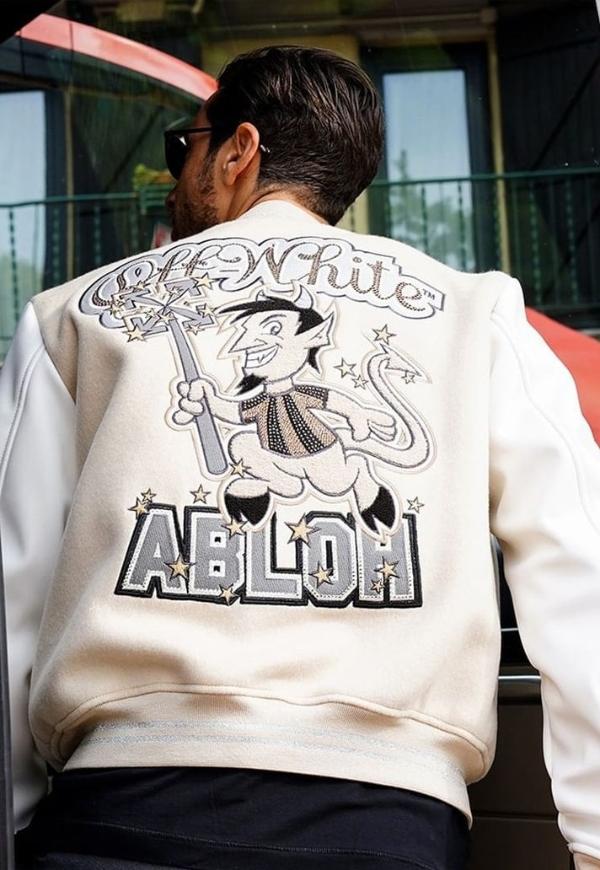 A guy is wearing AC Milan Off white Varsity Jacket facing backwards