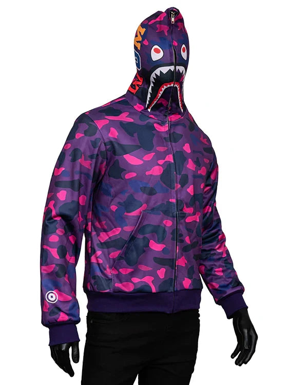 Purple and pink camouflage full-zip hoodie with an aggressive shark face motif printed across the hood.