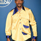 Anthony Mackie a yellow satin shirt with blue accents against a blue background with 'The Tonight Show Starring Jimmy Fallon' logo.