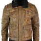 Brown leather jacket with patches and black fur collar on a white background