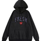 Black hoodie with 'FRESH' text and a red heart on a white background
