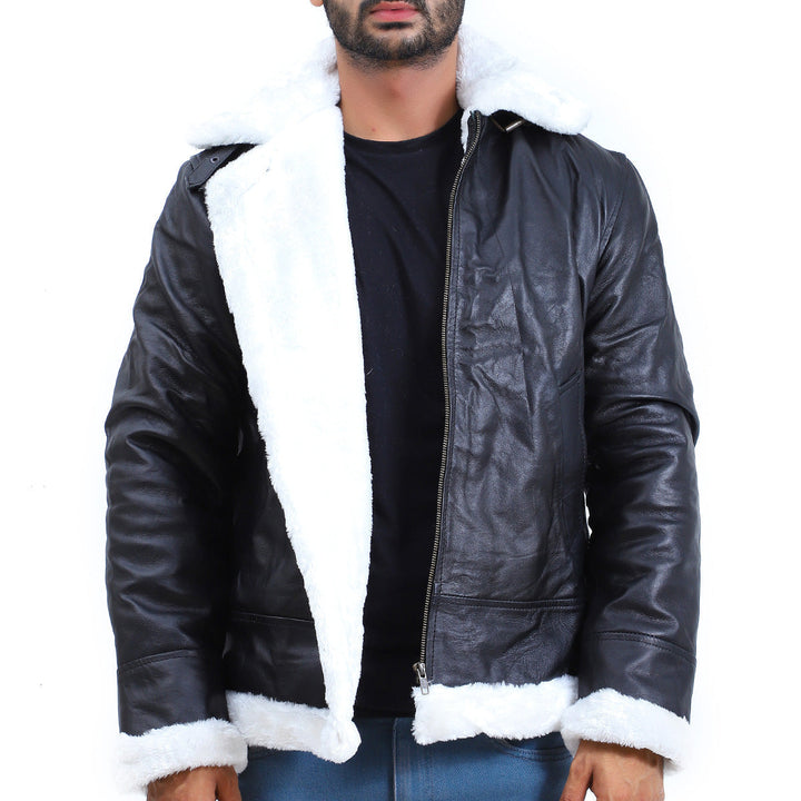 Black leather jacket with white fur trim worn by a person on a white background