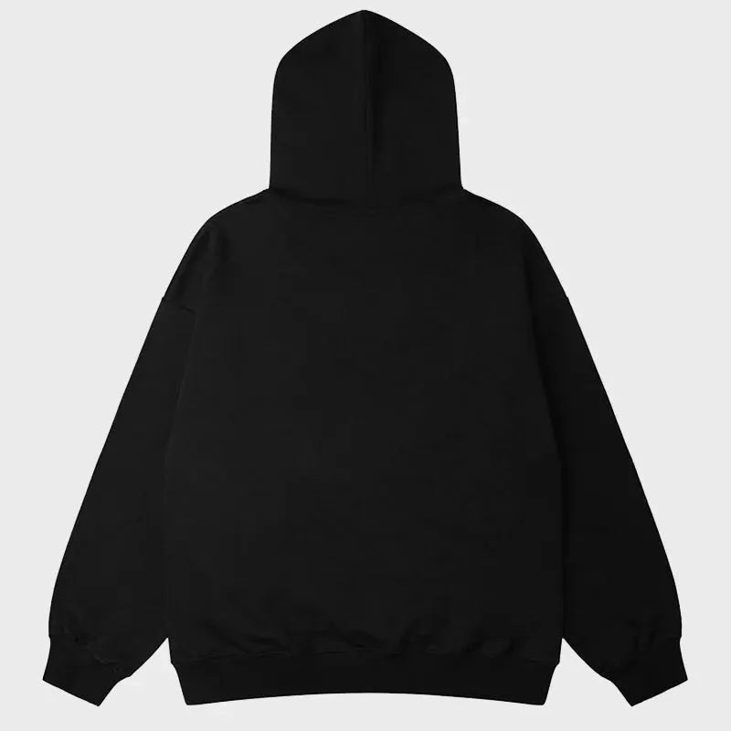 Back view of the solid black oversized cotton pullover hoodie. Highlights the fit and clean, unprinted reverse silhouette.