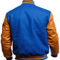 Blue varsity jacket with brown leather sleeves on a white background
