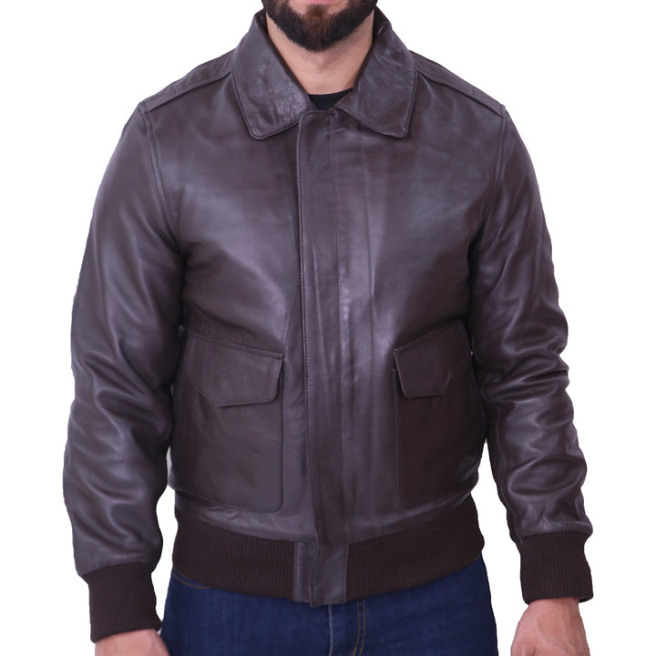 Brown leather jacket worn by a person on a white background