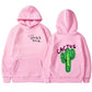 Pink hoodie with 'Cactus Jack' text and cactus graphic on a white background