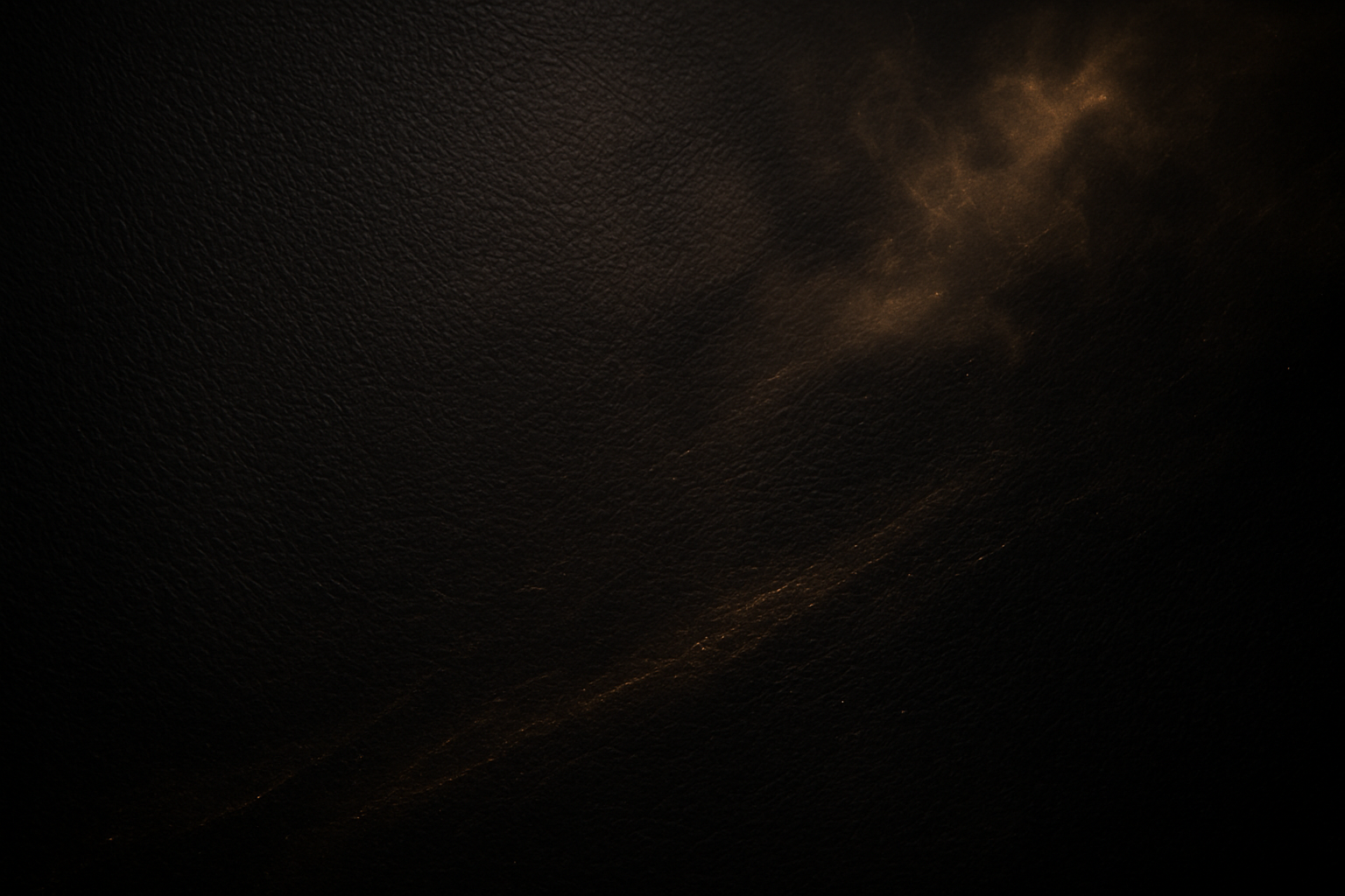 Abstract brown cloud-like shape on a dark textured background