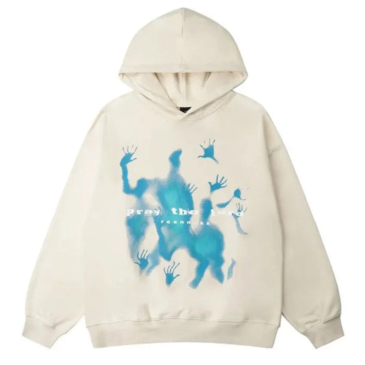 Front view of an oversized ecru cotton pullover hoodie with a vibrant blue, ethereal graphic print and the text 'Pray the Lord' on the chest.