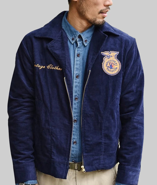 Man wearing a ffa jacket with a logo and text on a gray background