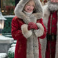 Close view of Red Christmas Chronicles 2 Mrs Claus Coat, showing the fur-lined hood and sleeve.