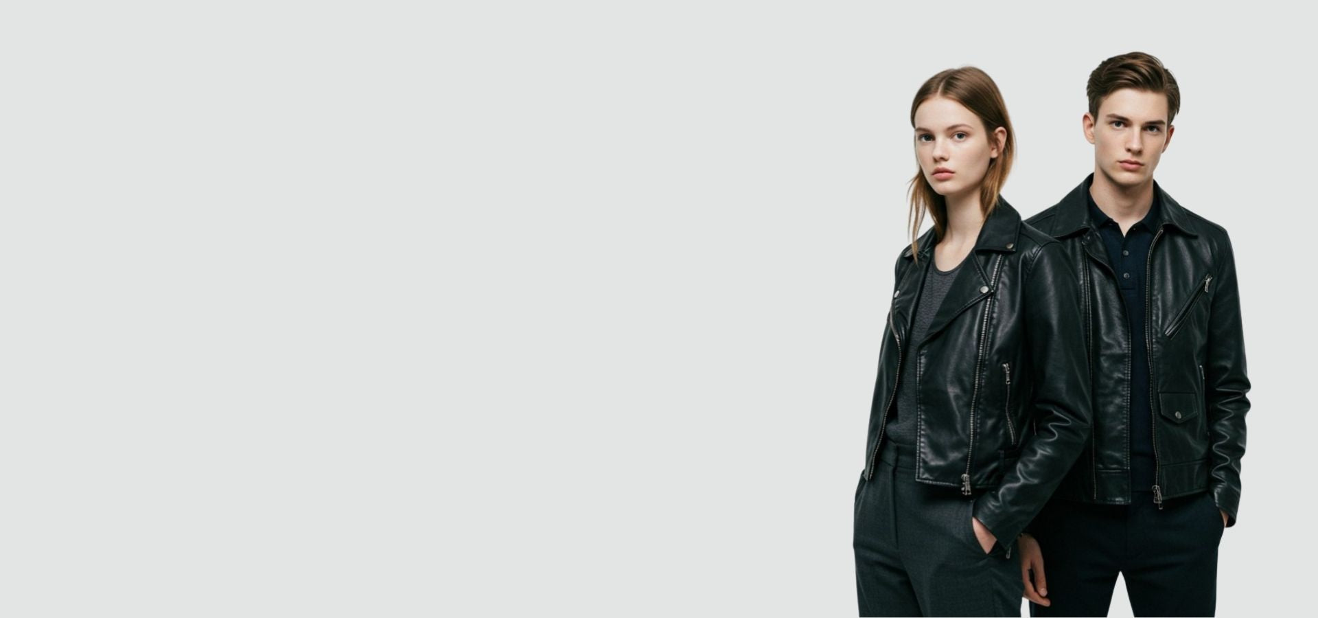 a girl and a boy wearing black leather jackets 