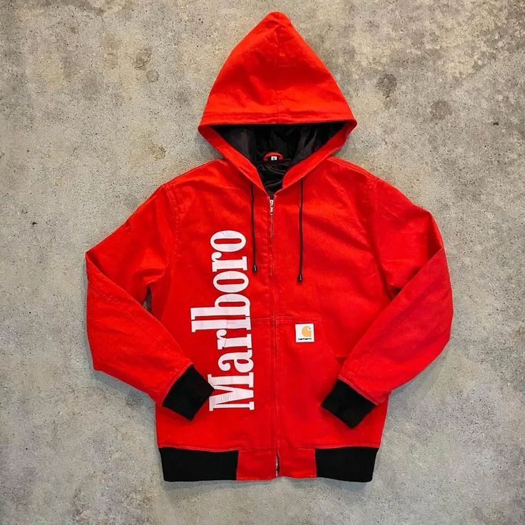 Marlboro Carhartt Red Jacket with 'Marlboro' branding on a concrete surface