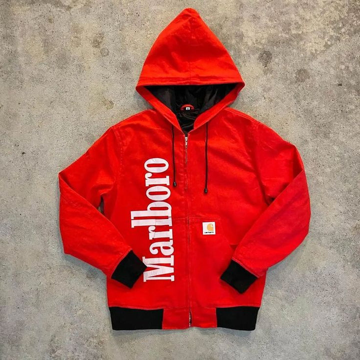 Marlboro Carhartt Red Jacket with 'Marlboro' branding on a concrete surface