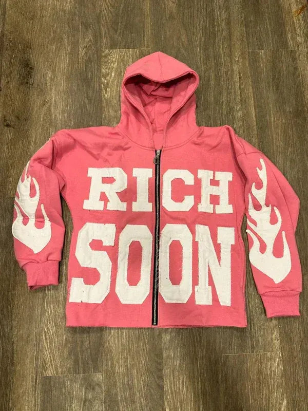 Front view of Pink Rich-Soon-Zip-Up-Hoodie