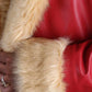 Close view of THE CHRISTMAS CHRONICLES 2 RED SANTA COAT, a holiday showstopper.