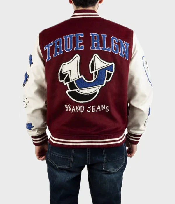 Person wearing a maroon and beige True Religion Letterman Jacket with 'True Rlgn' branding on the back.