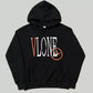 Black hoodie with 'VLONE' logo on a gray background