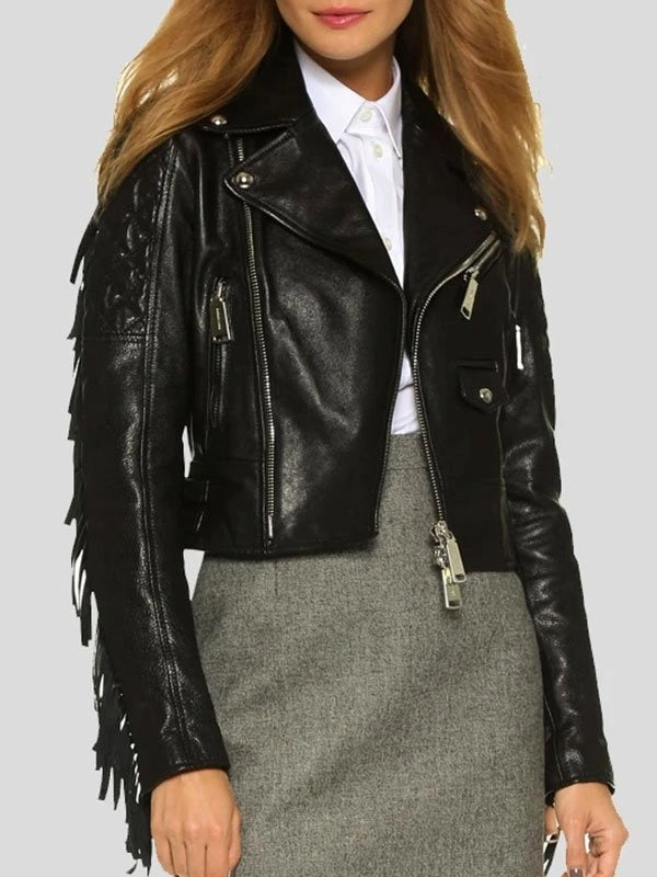 Black leather jacket with fringe details on a plain background