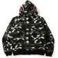Camouflage black bape hoodie with colorful shark design on a white background