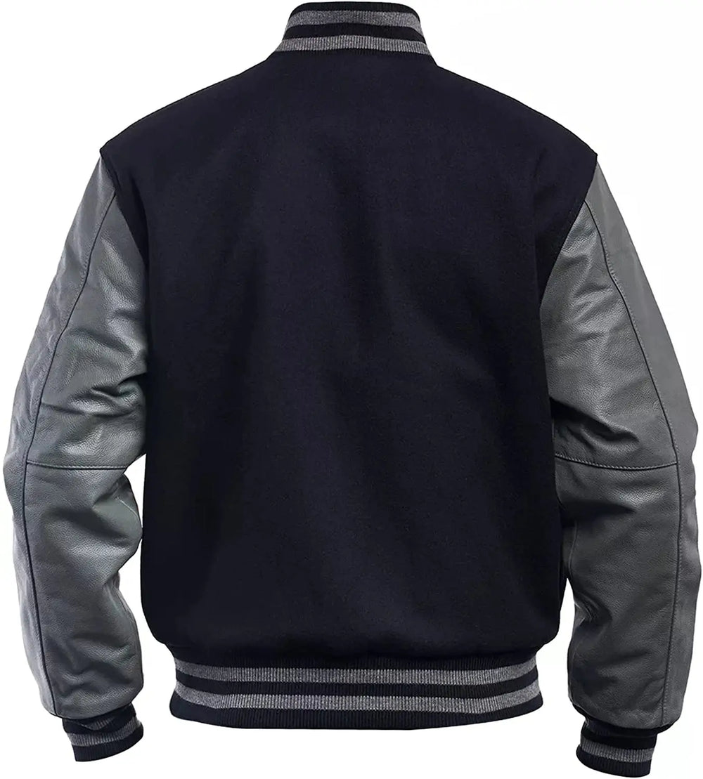 Black and gray varsity jacket with leather sleeves on a white background