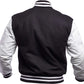 Black and white varsity jacket on a white background