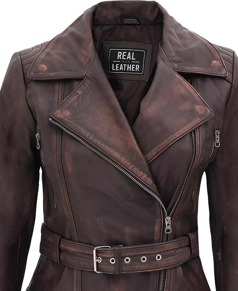 Brown leather jacket with visible 'Real Leather' label on a white background
