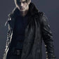 leon kennedy wearing a dark leather coat with fur trim against a dark background